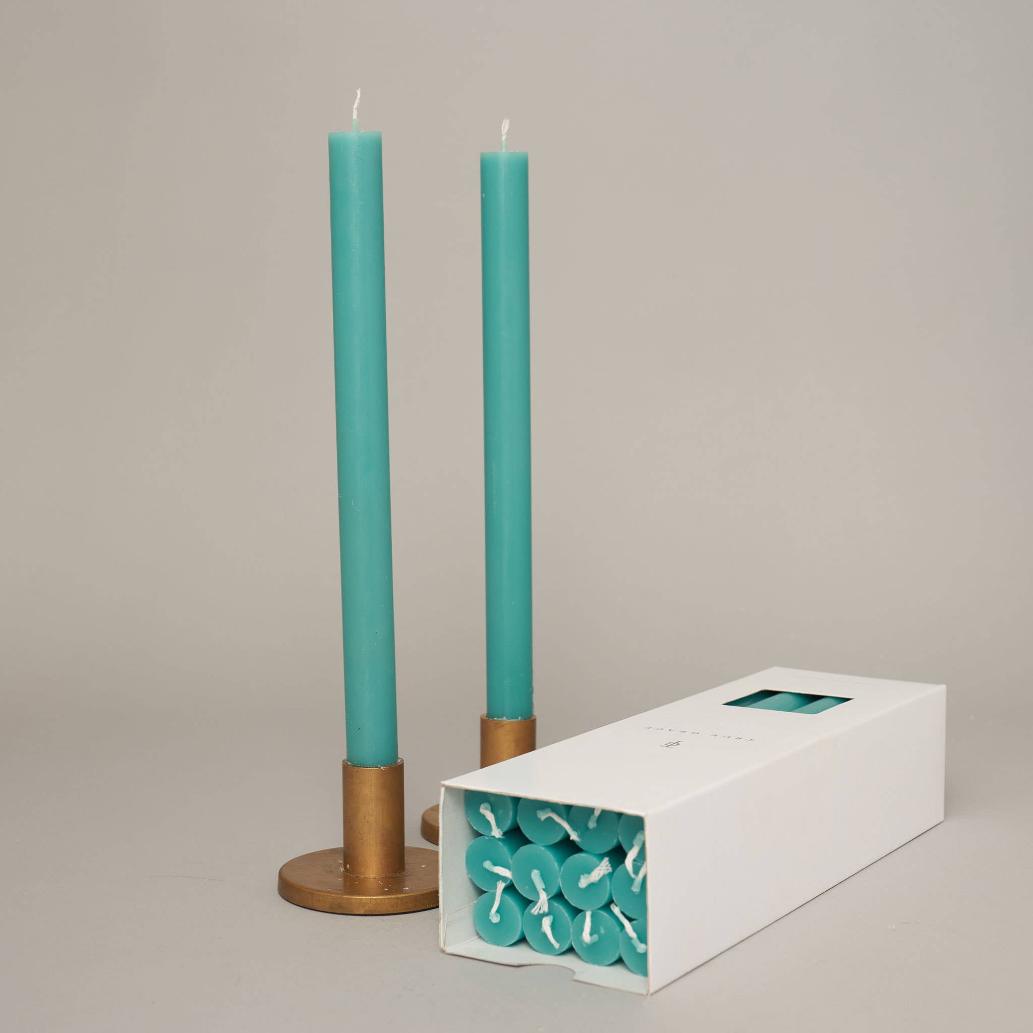 True Grace tall dinner candle in turquoise