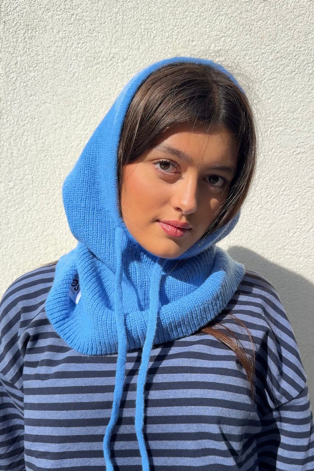Cornflower blue knitted balaclava with tie fastening