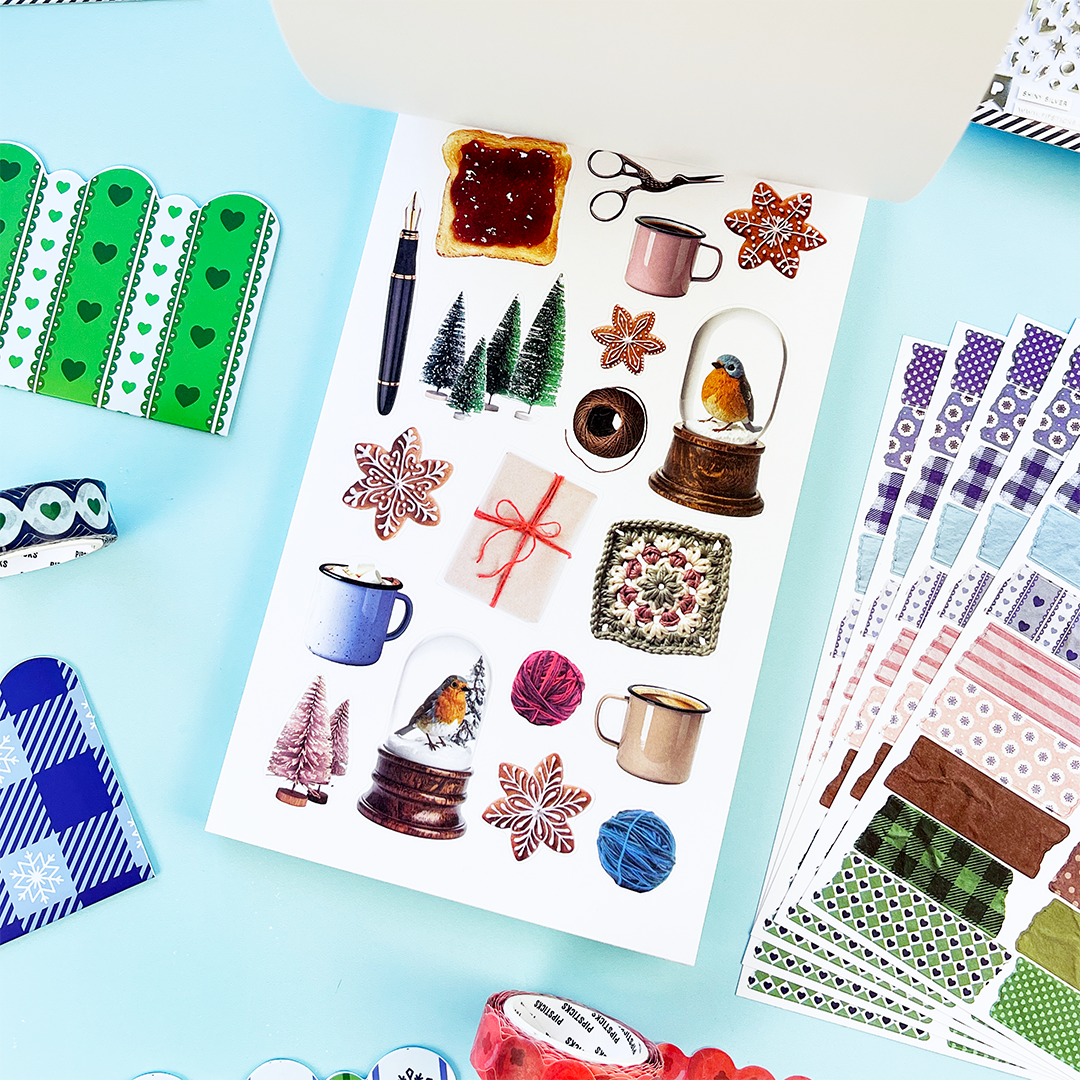 Winter Whimsy sticker book page of wintery stickers