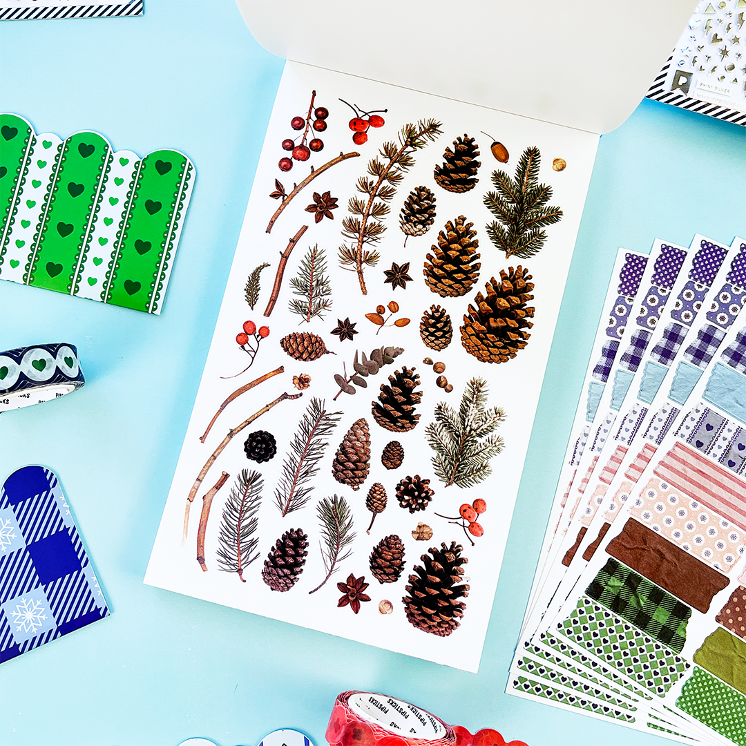 Winter Whimsy sticker book page of wintery stickers