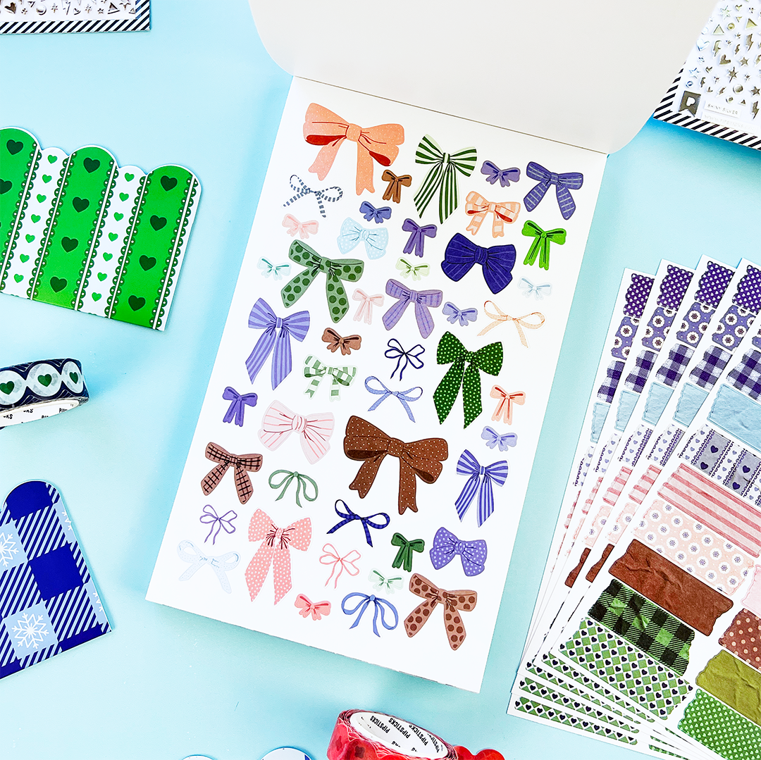 Winter Whimsy sticker book page of wintery stickers