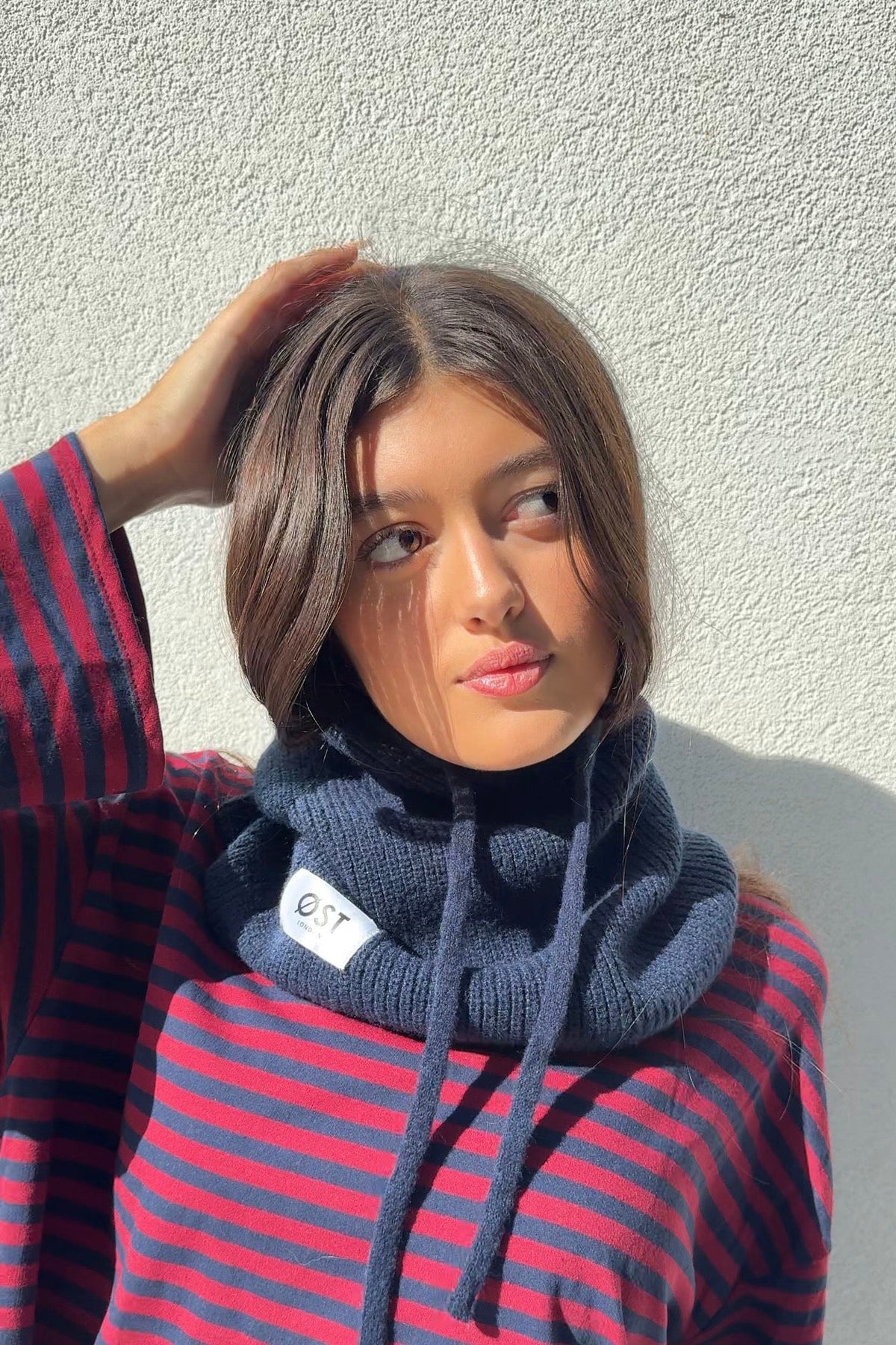 Navy cashmere blend balaclava worn as a hood