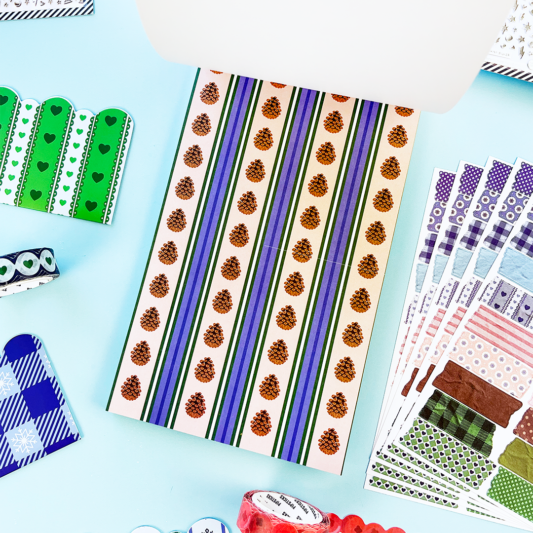 Winter Whimsy sticker book spread with decorative ephemera-style stickers