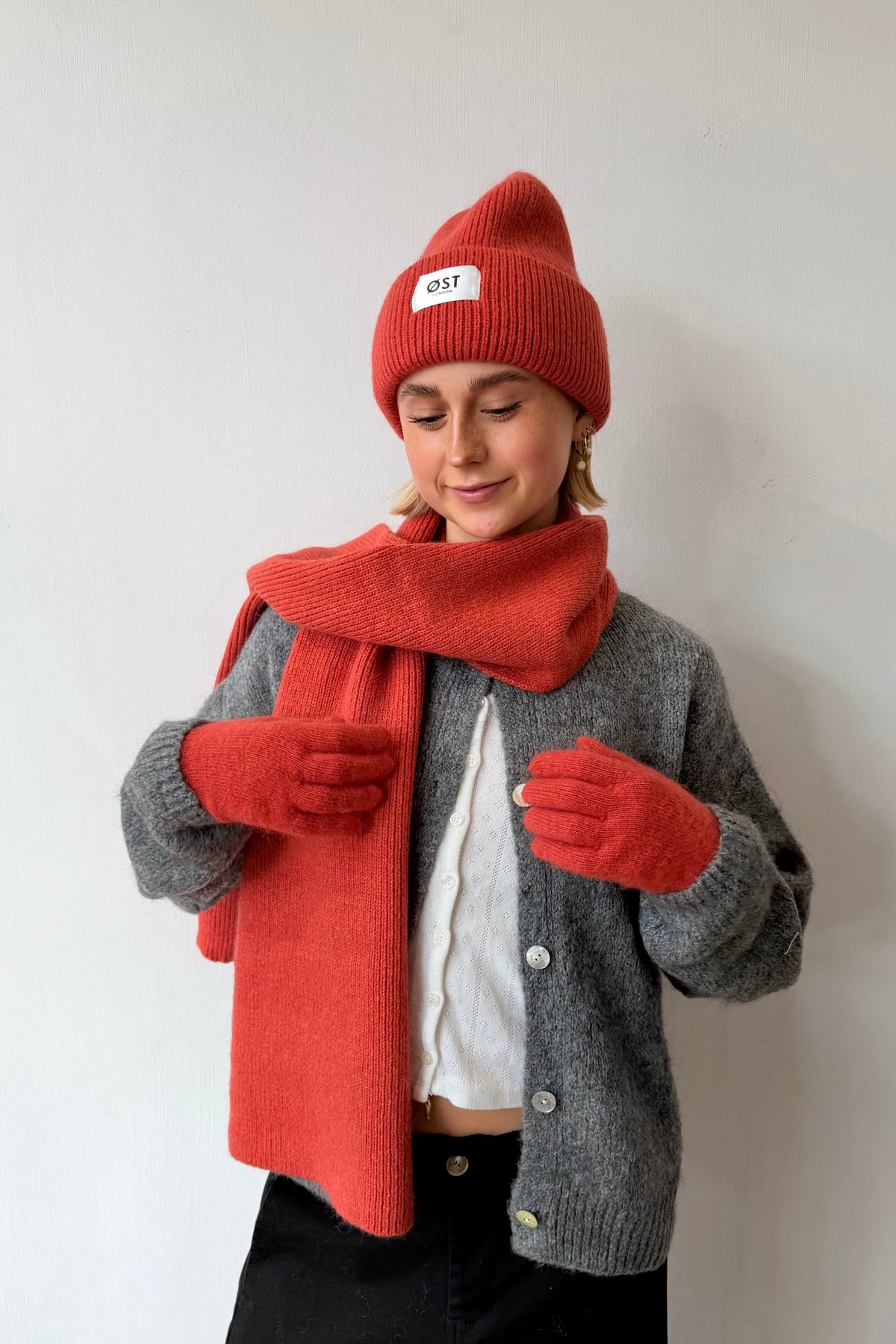 Clara blood orange beanie side view