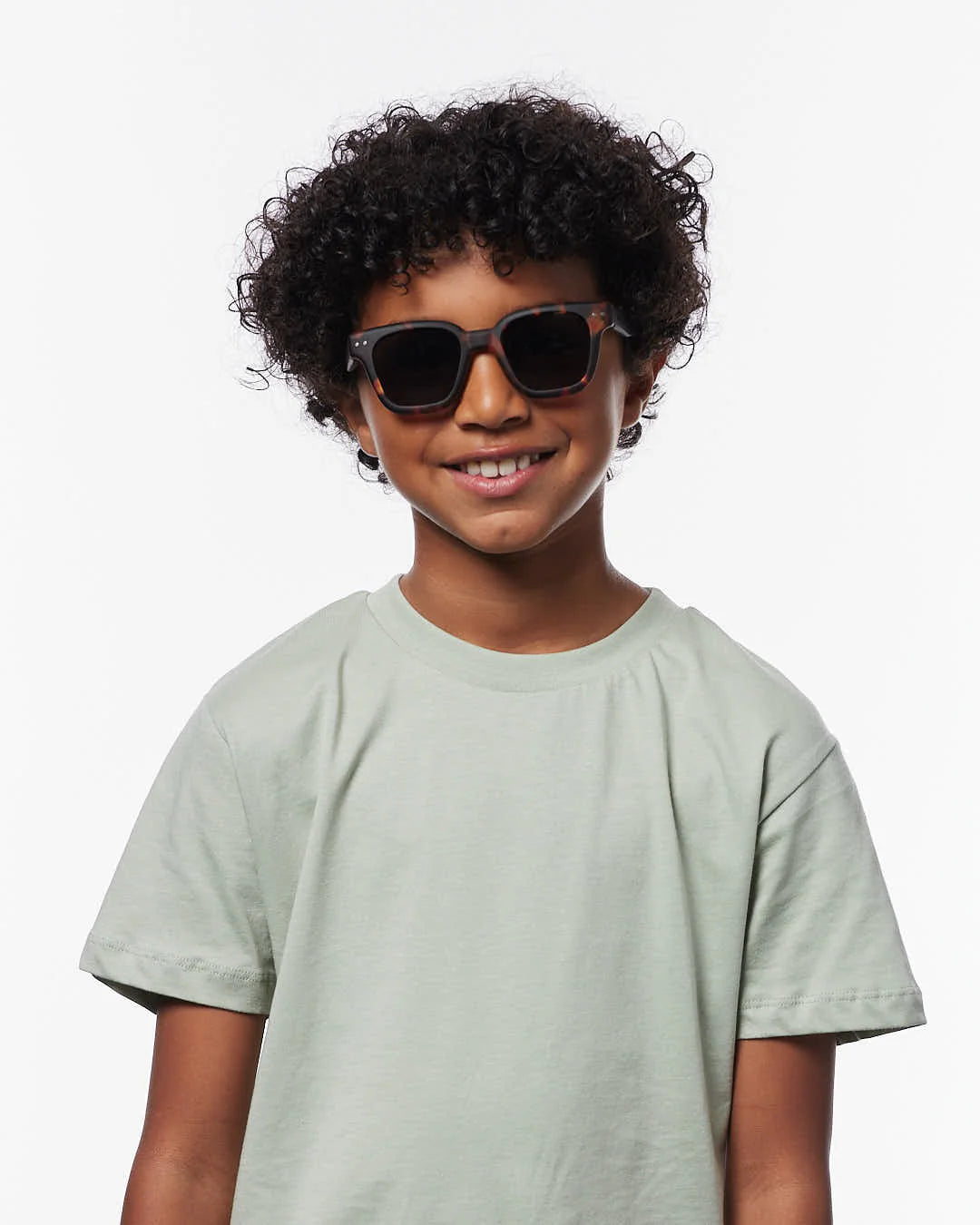IZIPIZI Junior Road tortoise sunglasses ages 7–11 — child wearing side