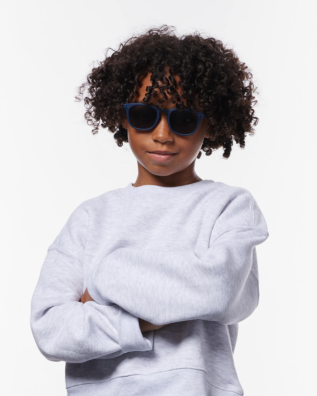 IZIPIZI Kids navy blue sunglasses ages 5–7 — child wearing side