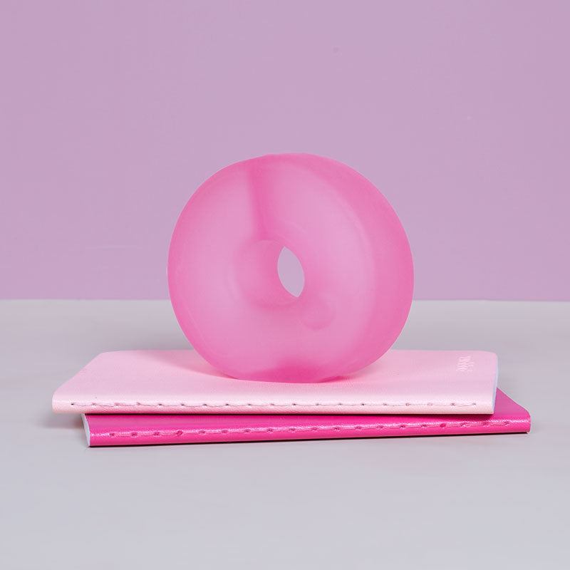 Speks Gump Loop in Moon Jelly on a desk