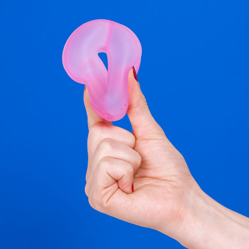 Speks Gump Loop in Moon Jelly held in a hand