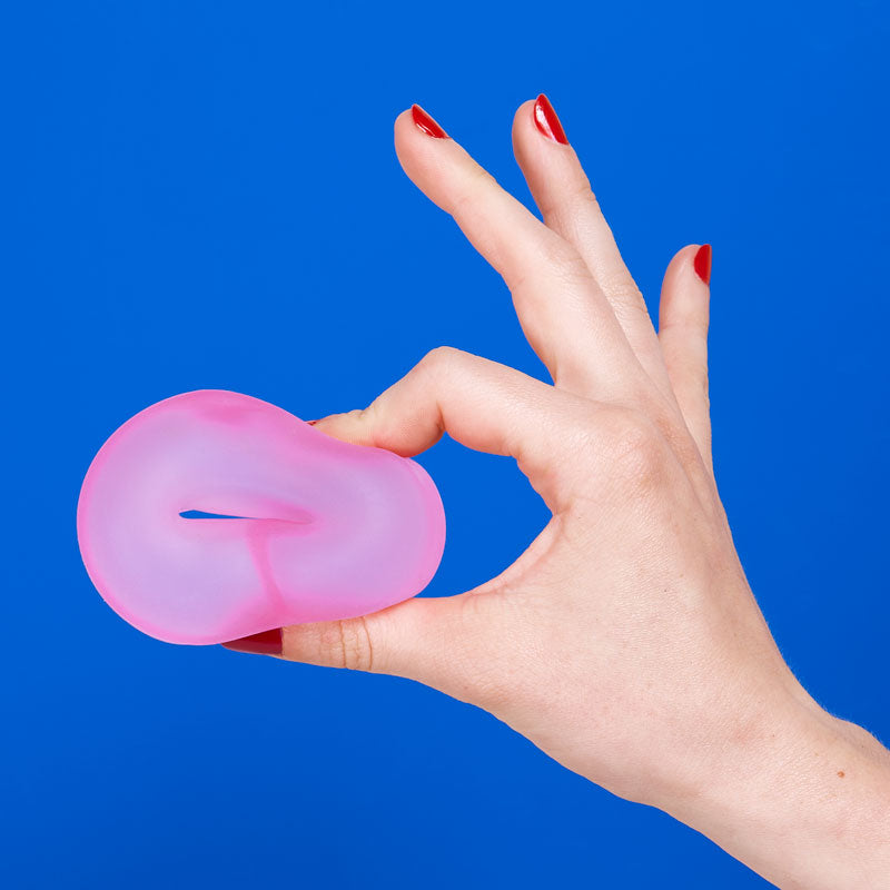 Speks Gump Loop in Moon Jelly held in a hand, photo 2