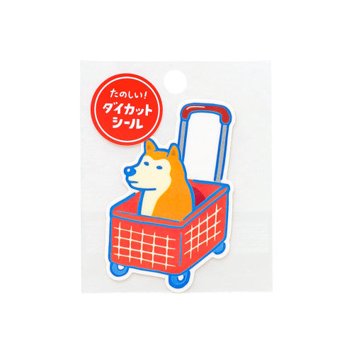 Hightide New Retro die-cut vinyl sticker of a dog in a shopping trolley
