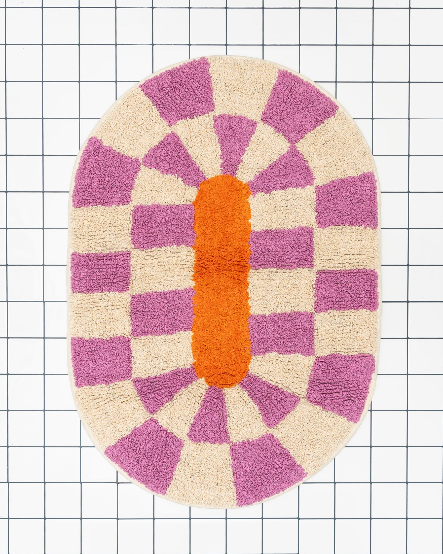 Rita bath mat in magenta by Tarta Gelatina