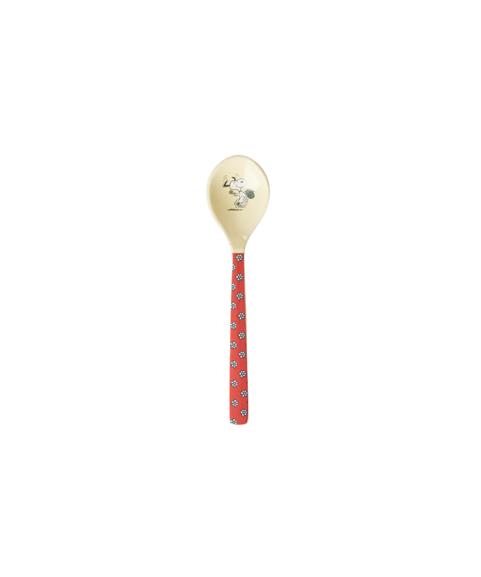 Decorative spoon with a red handle and white bowl on a white background