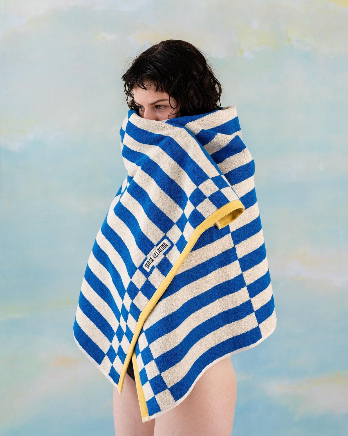 Clubhouse bath towel blue, folded showing 600GSM terry texture