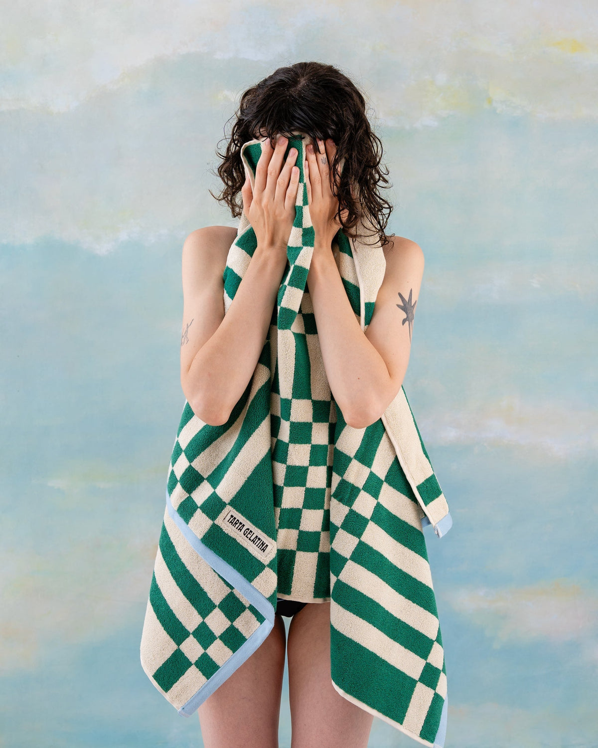 Marina bath towel green, folded showing 600GSM terry texture