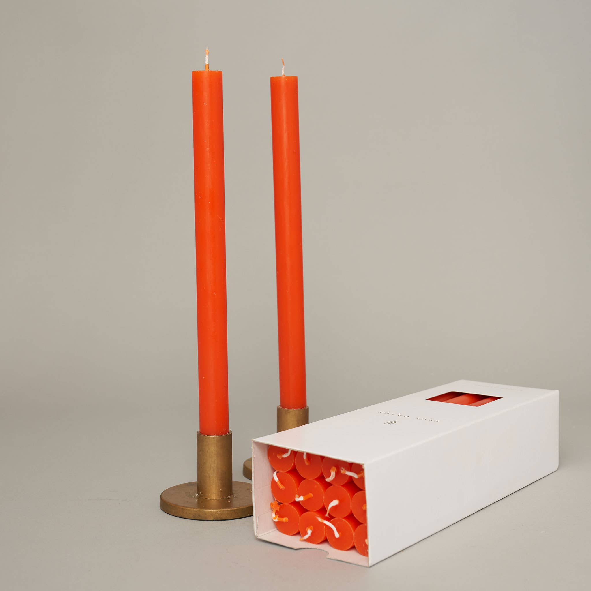 True Grace tall dinner candle in tangerine