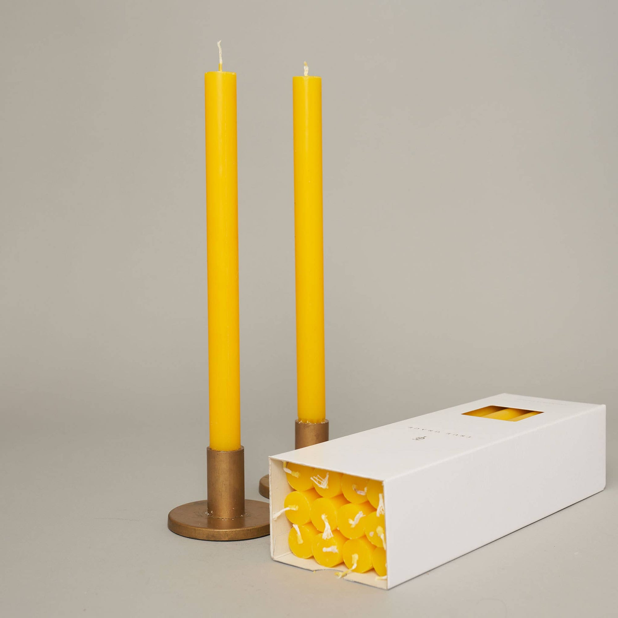 True Grace tall dinner candle in yellow
