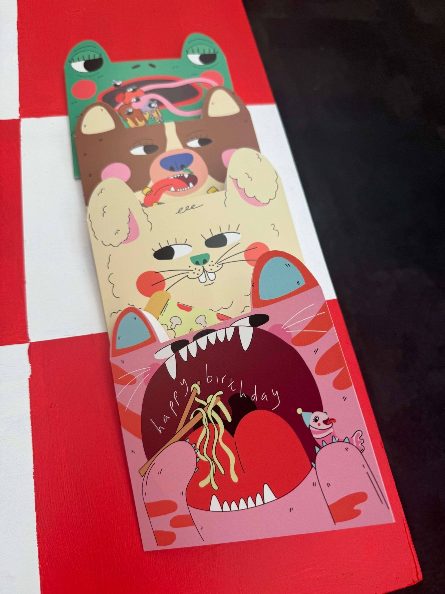 Dog eats hula hoops - Die cut kids greeting card - Eat the Moon | Greeting cards and stationery Modern Love Store Glasgow