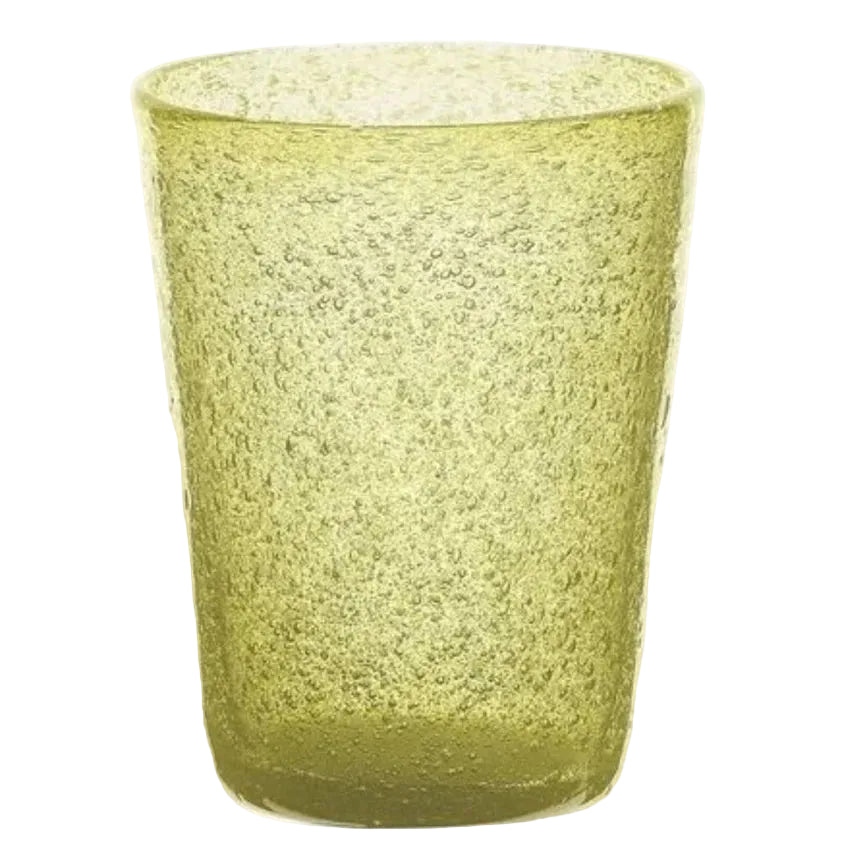 Green textured glass tumbler on a white background